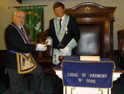 WBro Tempest presented the Travelling Gavel to the incoming WM, WBro Graham Hawker WBro Tempest presented the Travelling Gavel to the incoming WM, WBro Graham Hawker