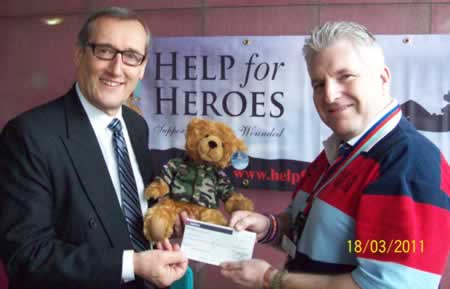(l to r) Terry Downing receives the cheque ffrom WBro Mike Nixon (l to r) Terry Downing receives the cheque ffrom WBro Mike Nixon