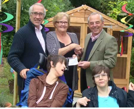 WBros Stephen Brown (back left) and Barrie Goulding, present the cheque to Helen Higgins, Hampton House the Team Coordinator, who was accompanied by two residents WBros Stephen Brown (back left) and Barrie Goulding, present the cheque to Helen Higgins, Hampton House the Team Coordinator, who was accompanied by two residents