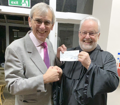 WBro Gerry Crawford presenting the cheque to Ian Richards